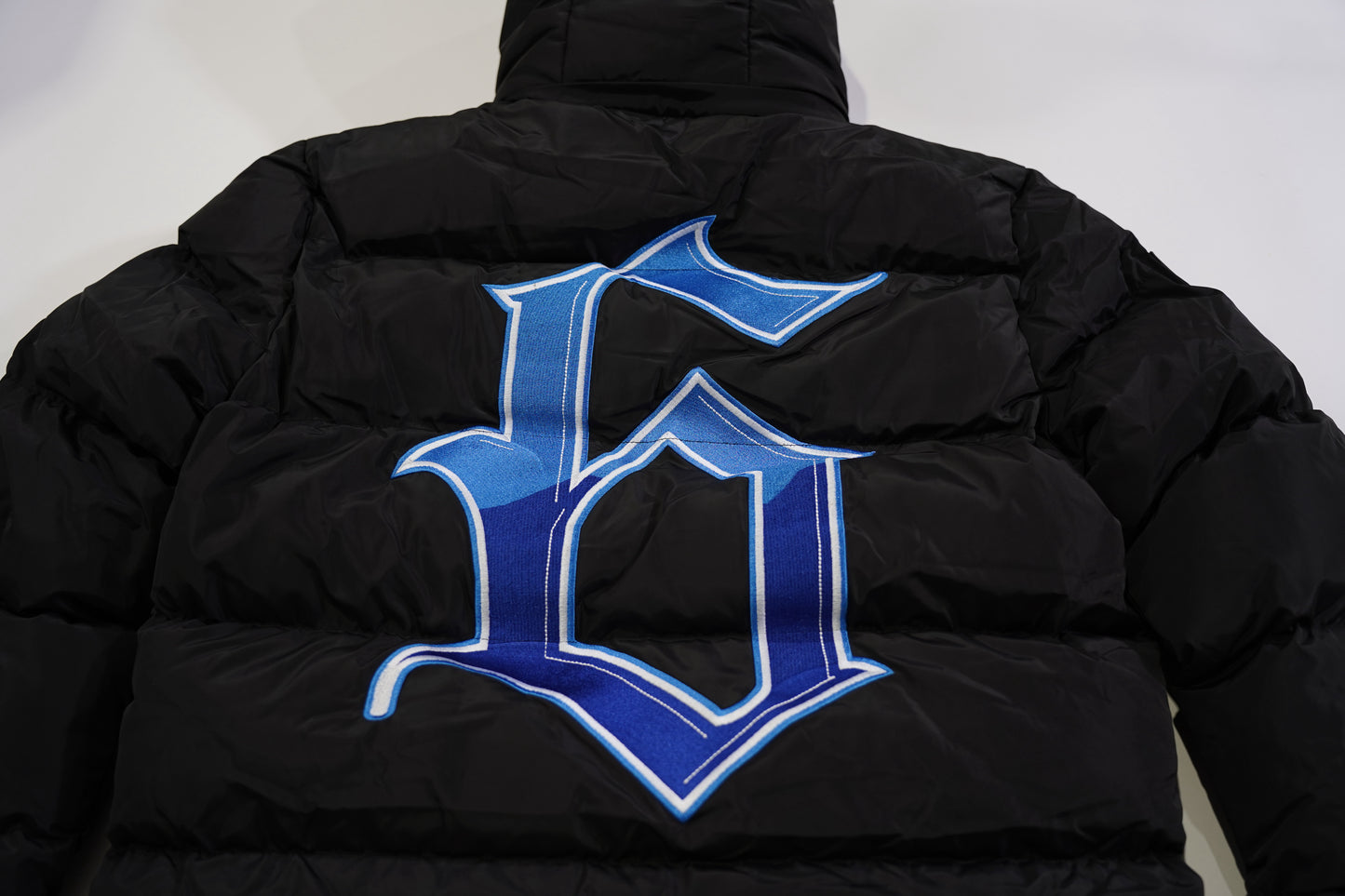 NIPSEY BLUE PUFFER JACKET